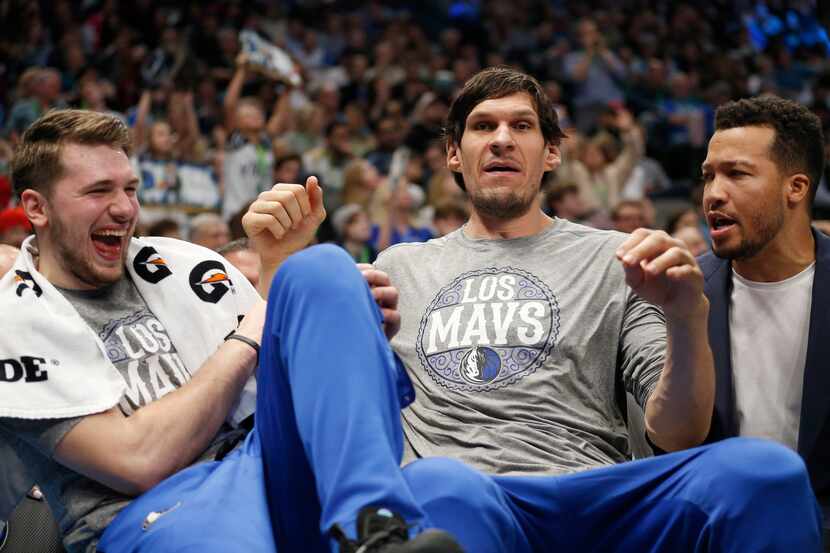 Dallas Mavericks center Boban Marjanovic (51) separates Dallas Mavericks guard Luka Doncic...