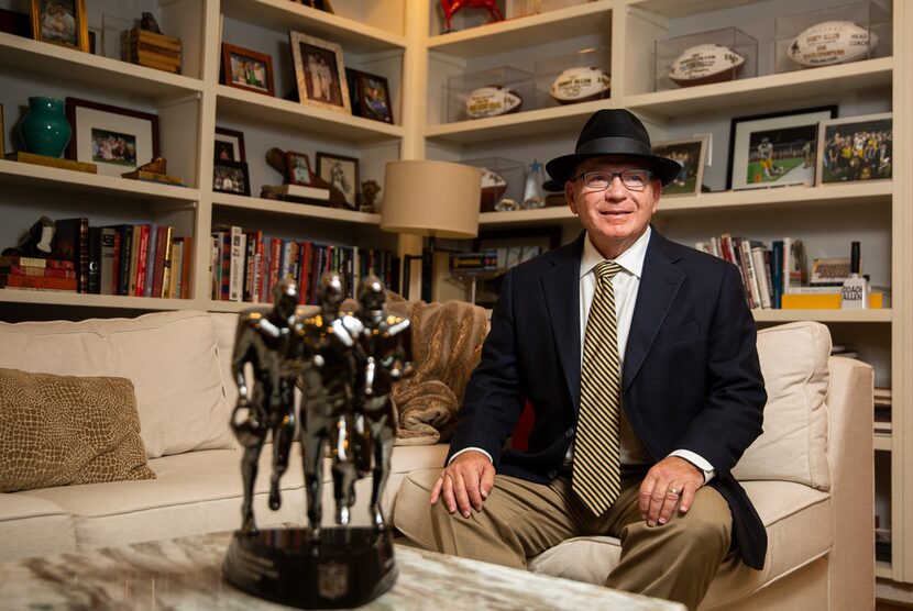 Highland Park football coach Randy Allen poses for portraits with his Don Shula NFL High...