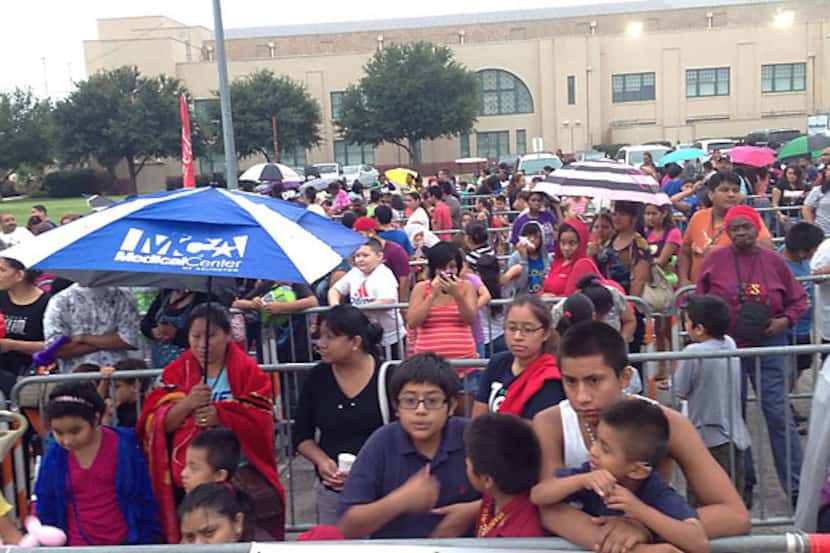 
Hundreds of school kids and their parents waited in the rain Friday morning at Fair Park...