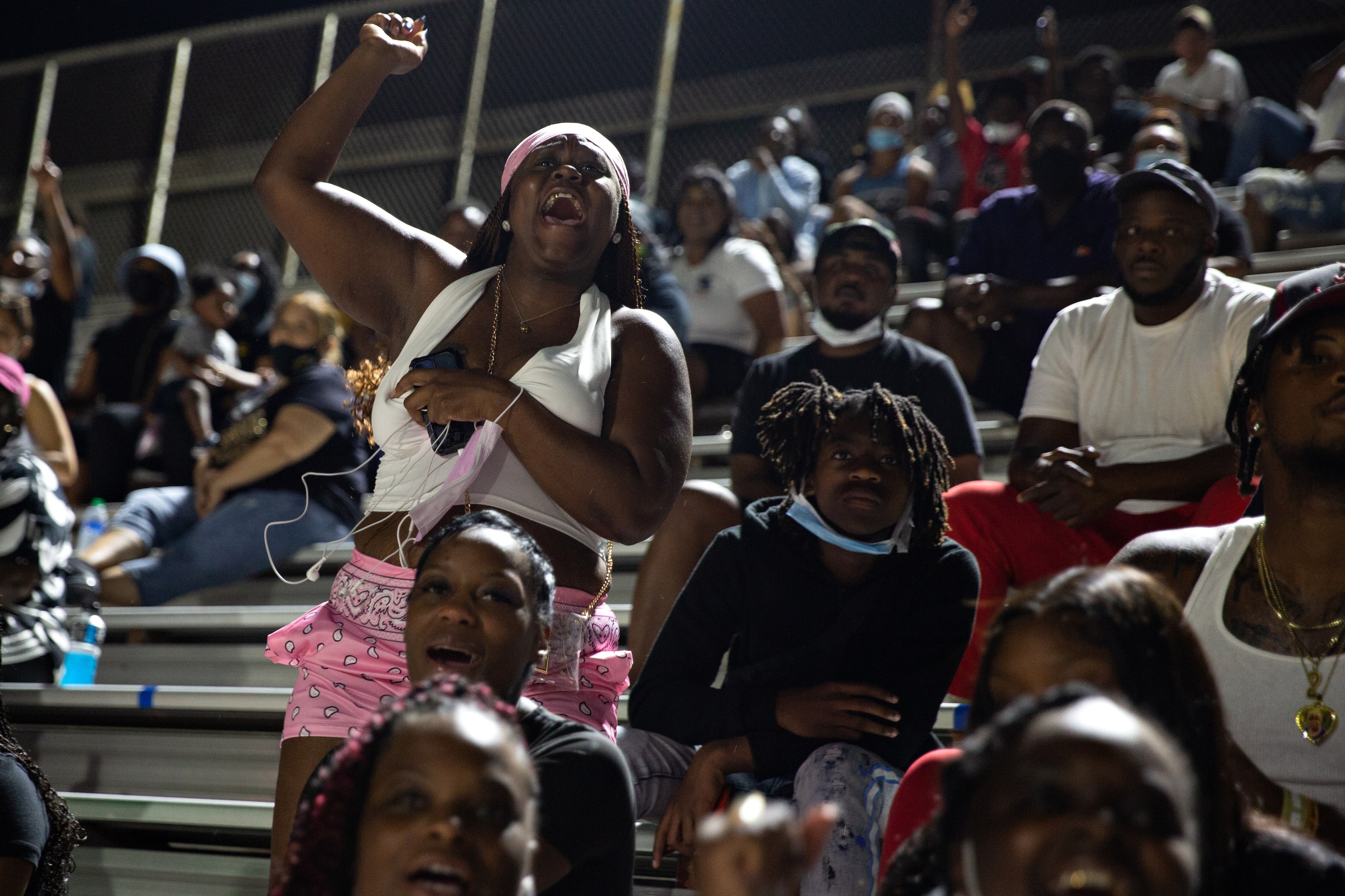 Miss Ruby Hudson cheers for her nephew Jayshon Hudson, who had just made a touchdown for...