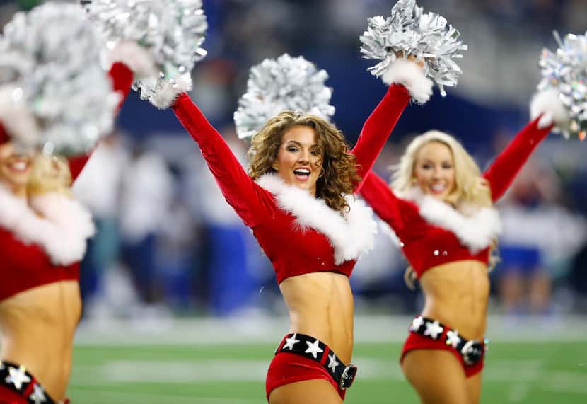 The Dallas Cowboys Cheerleaders perform in their holiday outfits during the Tampa Bay...