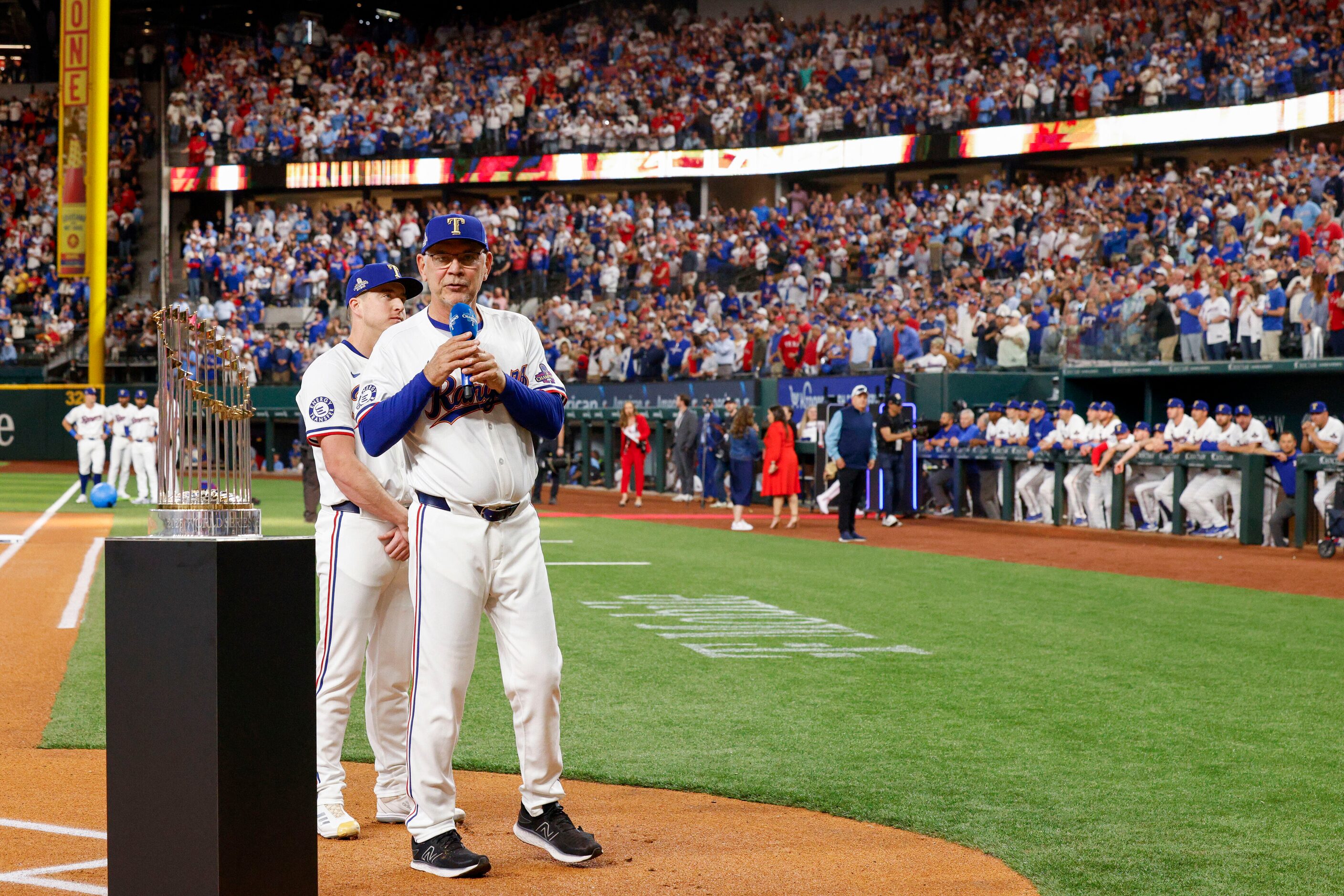 Texas Rangers manager Bruce Bochy speaks to fans before the season opener against the...