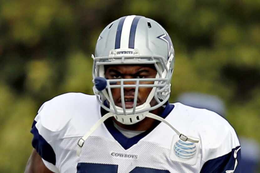 Dallas Cowboys offensive lineman Charles Brown runs to a drill during practice Wednesday,...