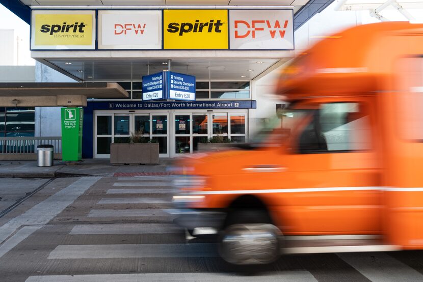 Signage for Spirit Airlines outside of Terminal E at the Dallas-Fort Worth International...