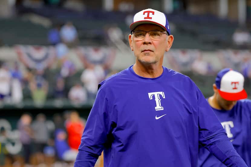 Texas Rangers manager Bruce Bochy walked off the field before a baseball game against the...