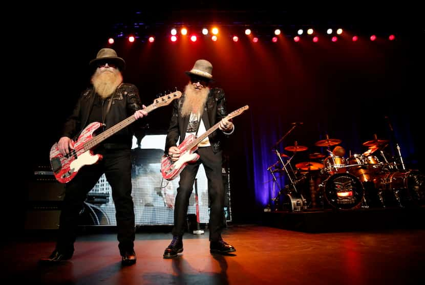 Dusty Hill (left) and Billy Gibbons were front and center as ZZ Top performed at the Music...