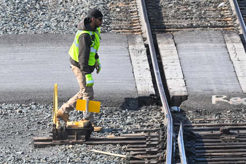 A rail worker switched a track for a locomotive in the Selkirk, N.Y., rail yard Wednesday....