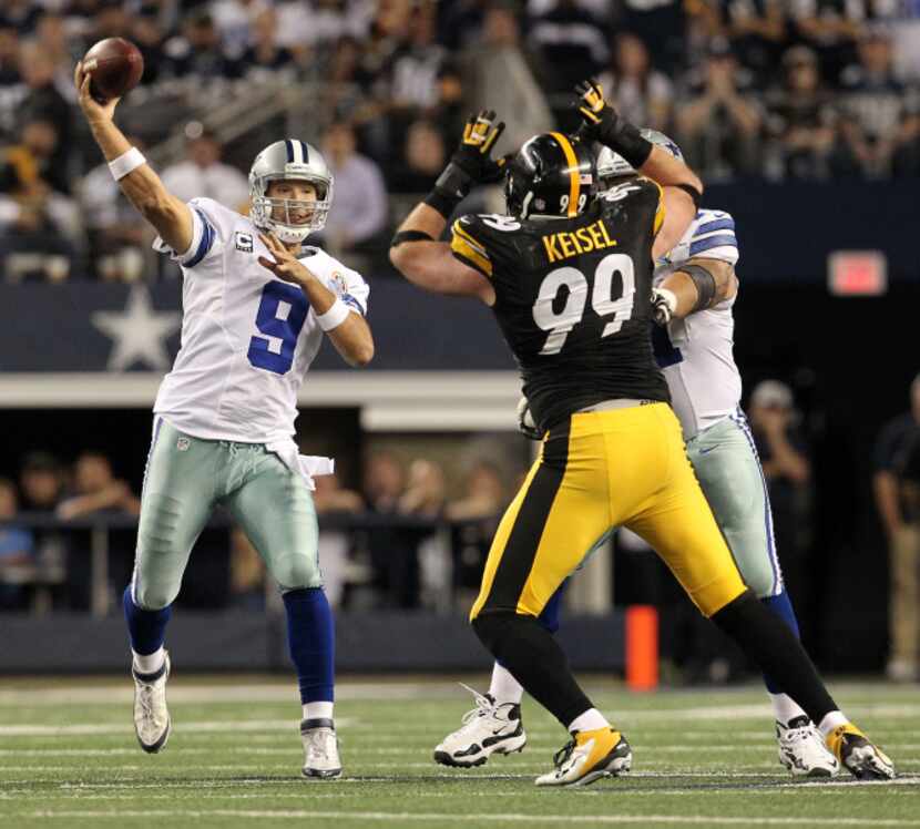 Dallas Cowboys quarterback Tony Romo (9) throws past Pittsburgh Steelers defensive end Brett...