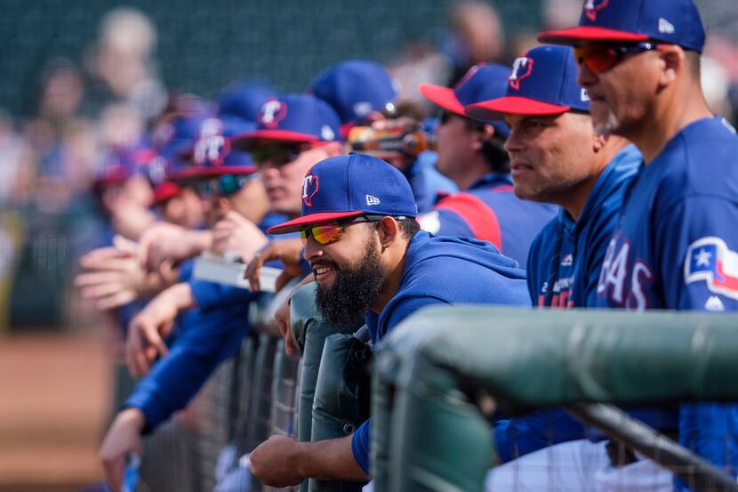 Texas Rangers second baseman Rougned Odor watches from the dugout during the first inning of...