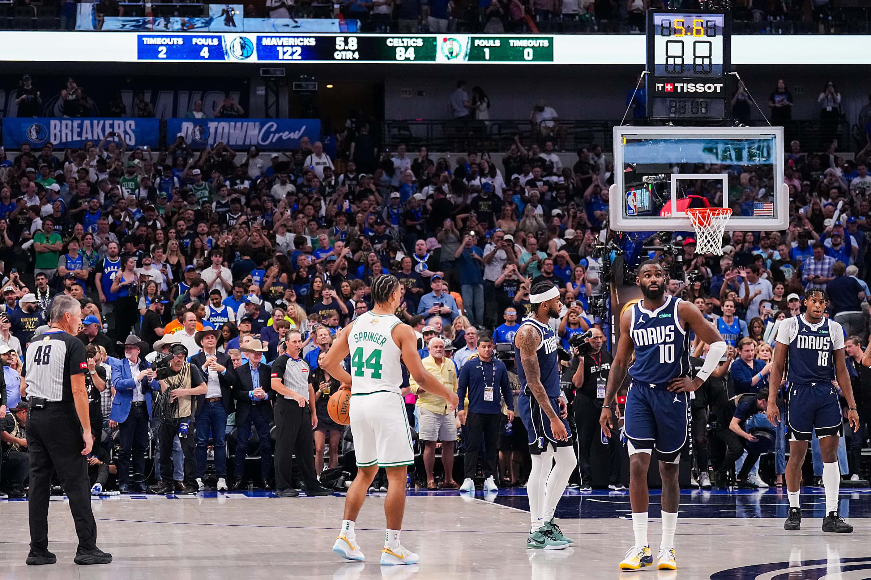 Boston Celtics guard Jaden Springer (44) dribbles the ball as the Celtics run out the clock...