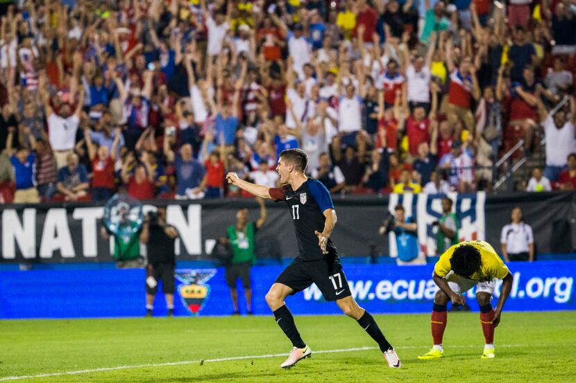 USA midfielder Christian Pulisic (17) celebrates after midfielder Nagbe Darlington (10)...