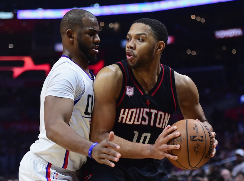 Houston's Eric Gordon (right).