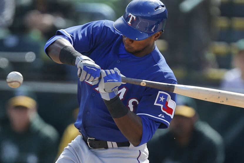 Texas leadoff hitter Jurickson Profar fouls off a pitch in the first inning during the Texas...