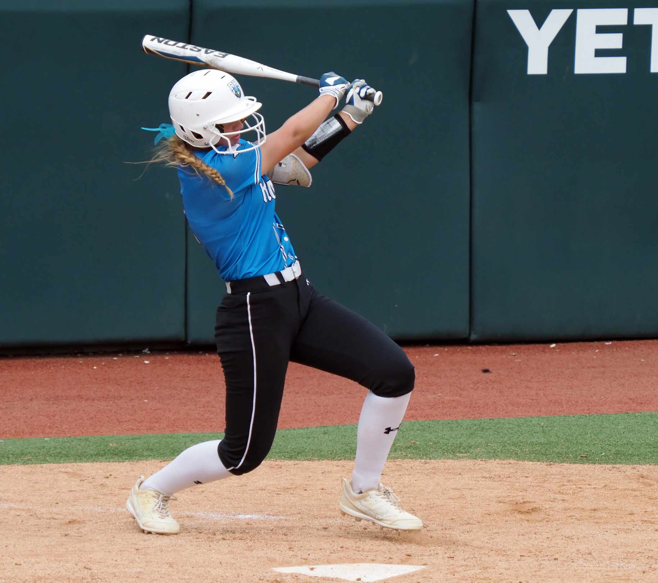 Prosper Rock Hill batter Ella Berlage gets a hit against Montgomery Lake Creek in the Class...