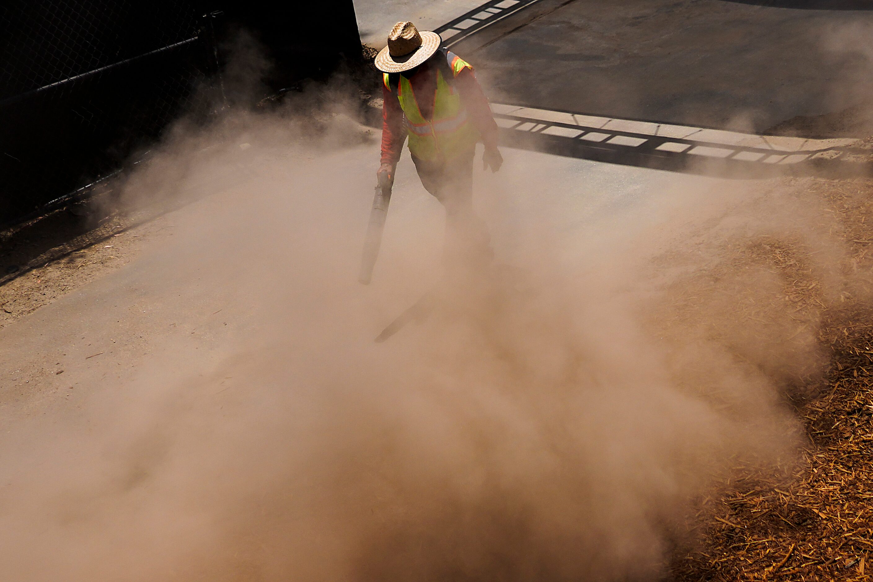 Workers prepare the complex for Wednesday’s start of Dallas Cowboys training camp on...