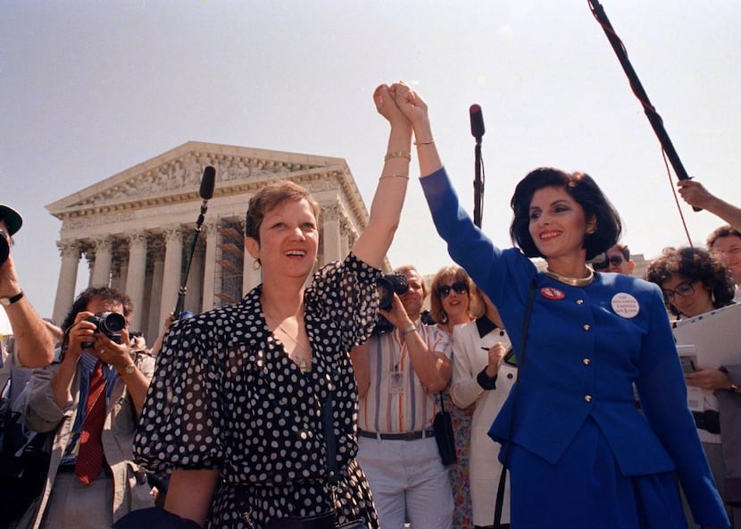 Norma McCorvey (left), with attorney Gloria Allred in 1989, was the "Jane Roe" in Roe vs....