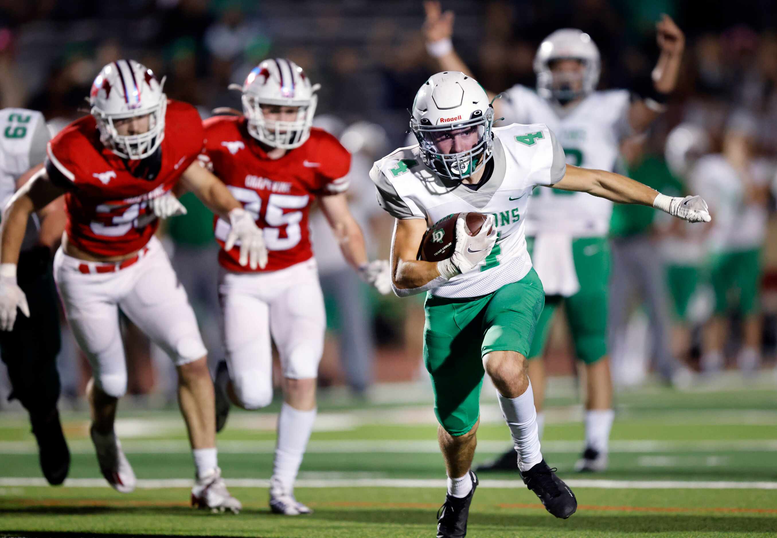 Lake Dallas running back Dylan Brauchle (4) races for a fourth quarter touchdown against...