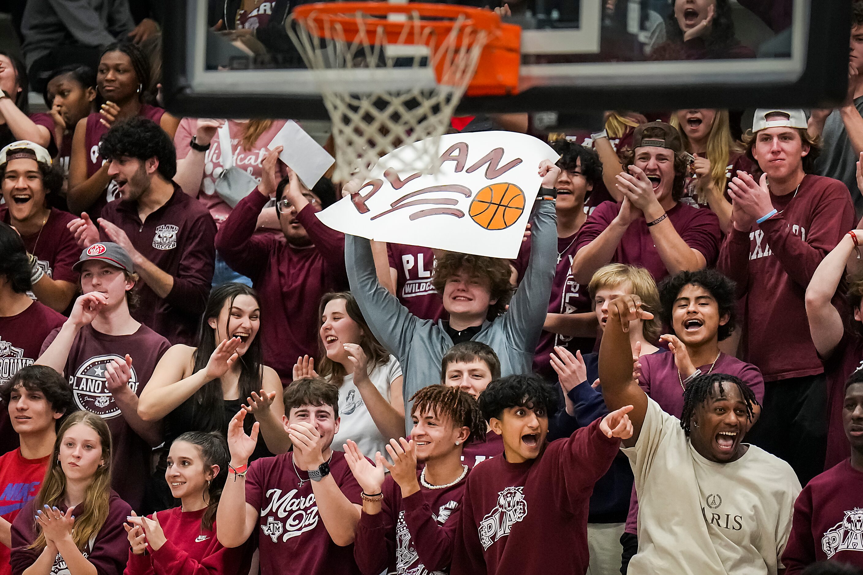 Plano fans cheer as their team takes the lead during the second half of a boys Class 6A...