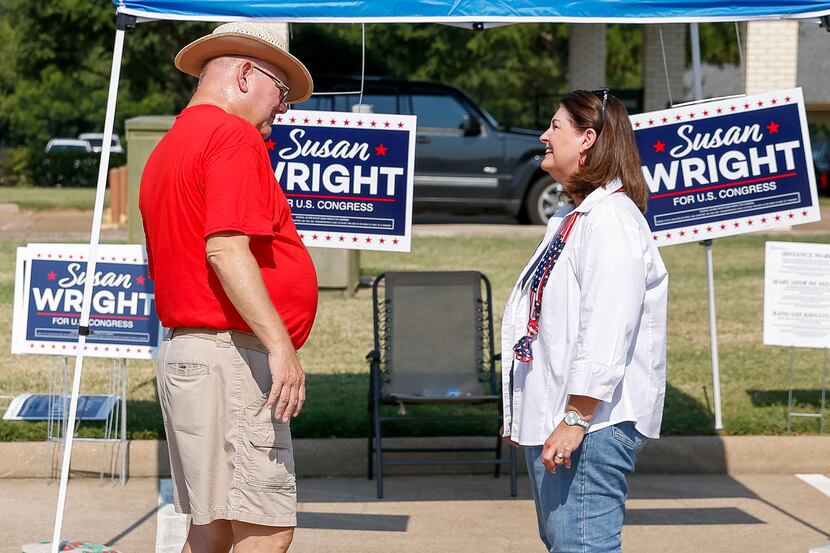 Susan Wright, Republican candidate for Texas’ 6th Congressional District (right), speaks...