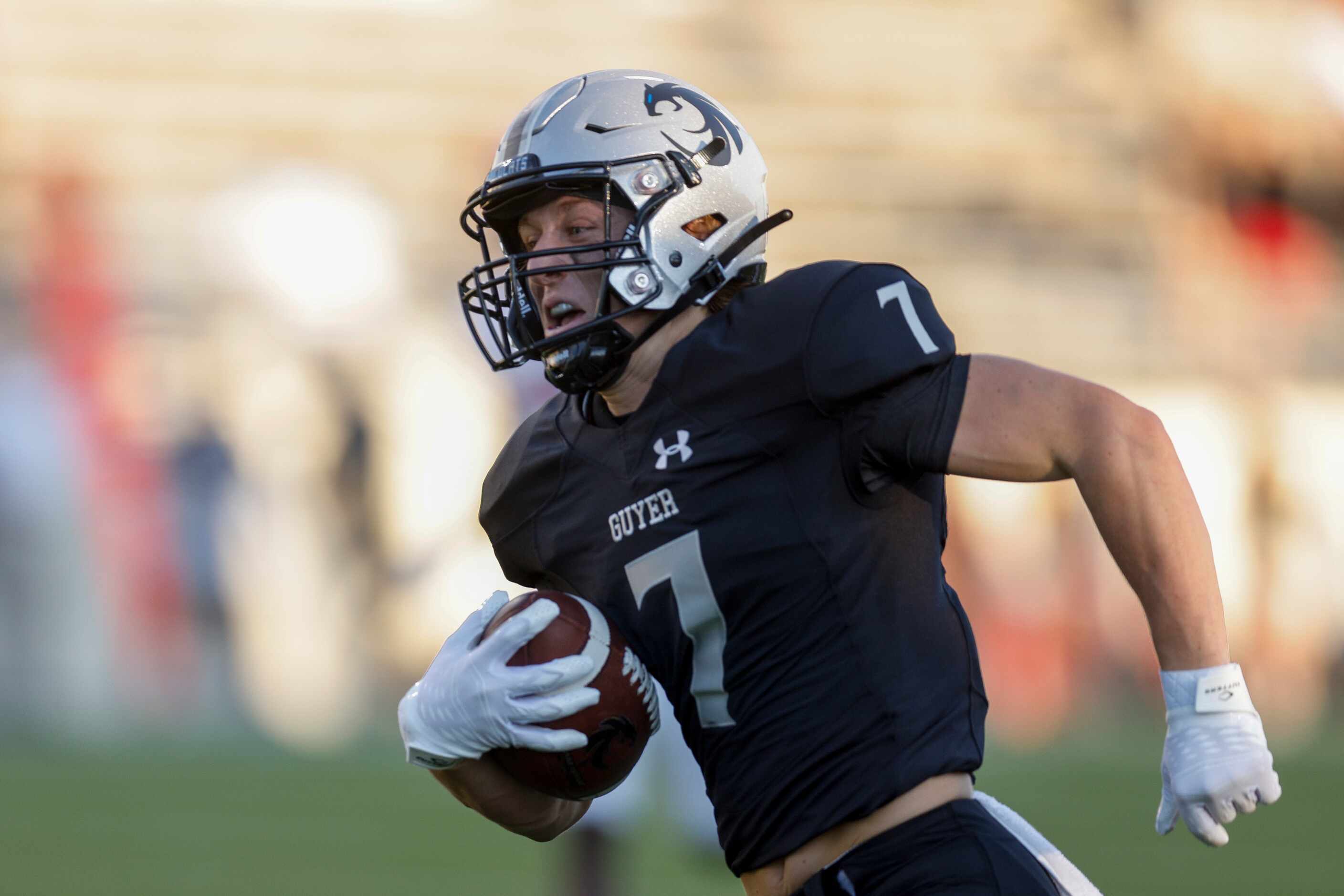 Denton Guyer wide receiver Landon Sides (7) scores a touchdown after catching a pass during...