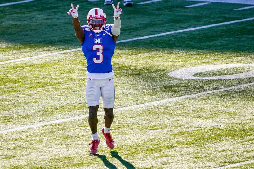 SMU wide receiver James Proche celebrates a touchdown reception by wide receiver Myron...