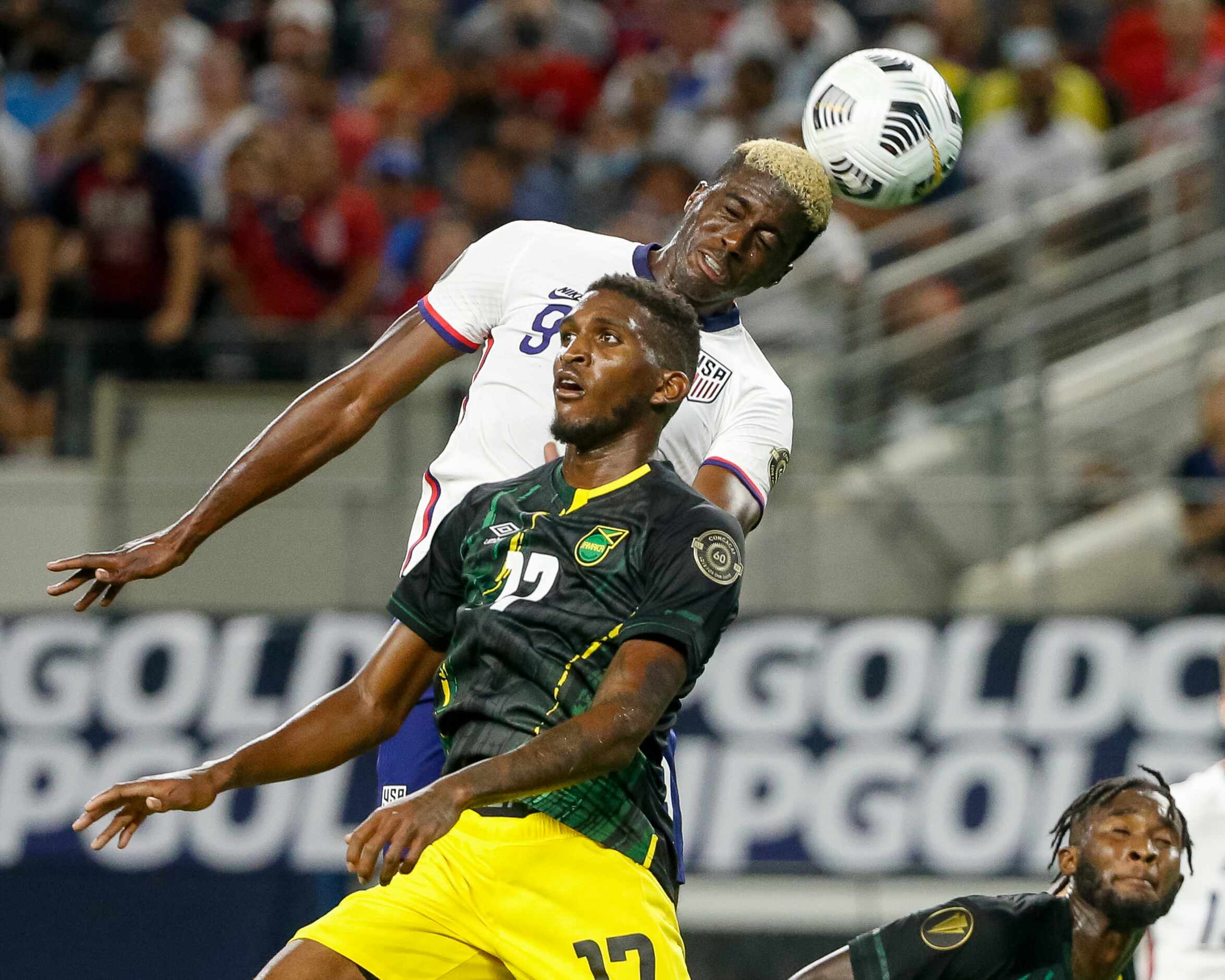 USA forward Gyasi Zardes (9) heads the ball over Jamaica defender Damion Lowe (17) during...