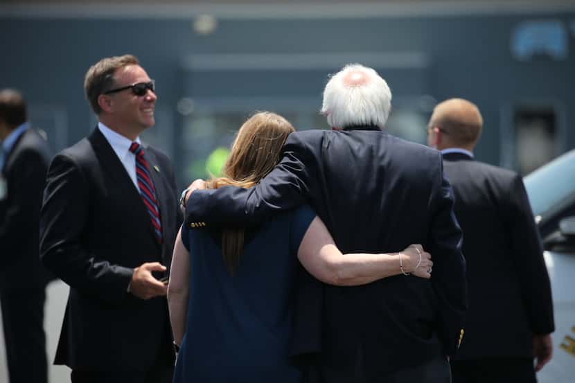 Sen. Bernie Sanders and his wife walk together upon arriving at Los Angeles International...