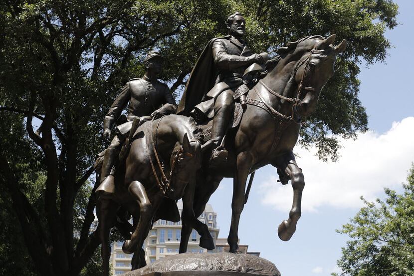 A statue of Confederate Gen. Robert E. Lee stands outside Robert E. Lee Park in Dallas.