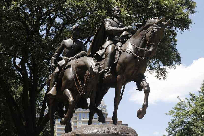 A statue of Confederate Gen. Robert E. Lee stands outside the park named for him in Dallas.