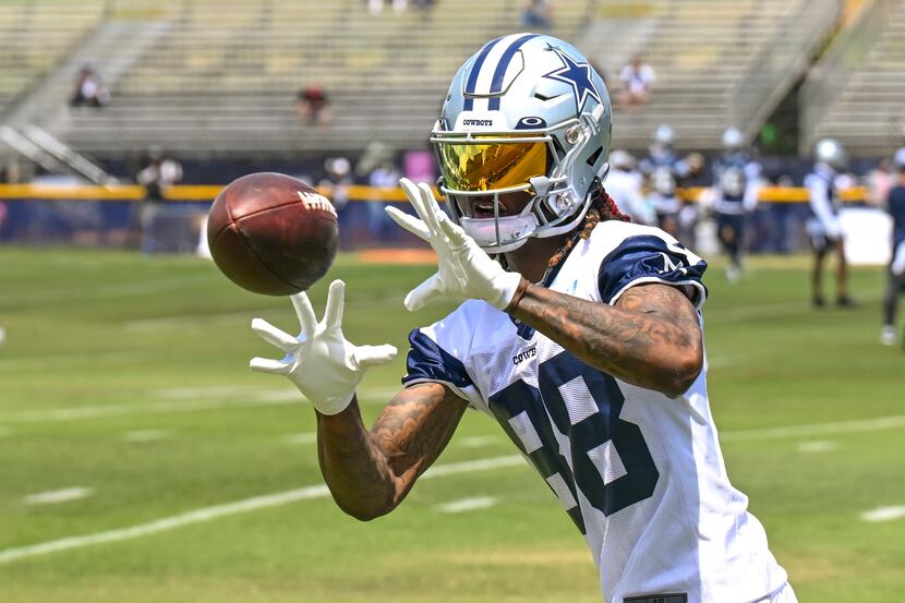 Dallas Cowboys wide receiver CeeDee Lamb makes a reception as he takes part in a passing...