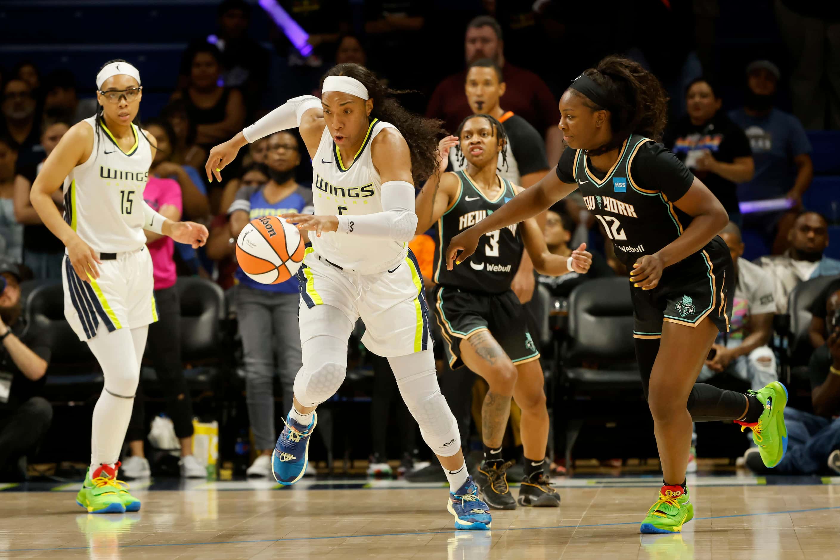 Dallas Wings forward Kayla Thornton (6) steals the ball away from New York Liberty forward...