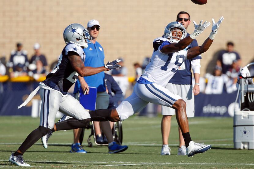 Dallas Cowboys wide receiver Brice Butler (19) reaches for the ball as Dallas Cowboys...