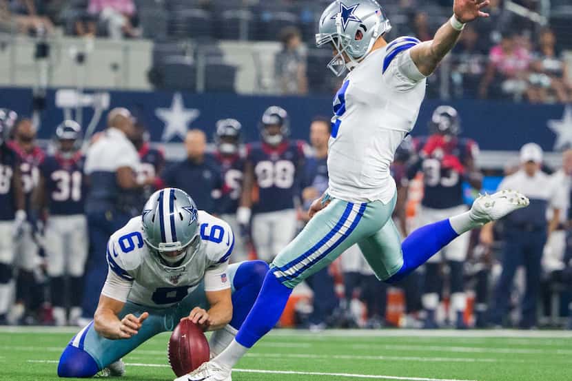 Dallas Cowboys kicker Brett Maher (2) kicks an extra point field goal during the first...