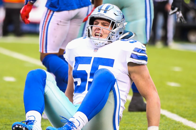 Dallas Cowboys outside linebacker Leighton Vander Esch (55) reacts before he is helped of...