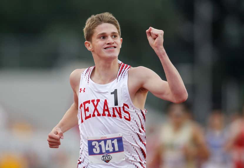Justin Northwest freshman Cooper Lutkenhaus pumps his fist as he sees his winning time of...