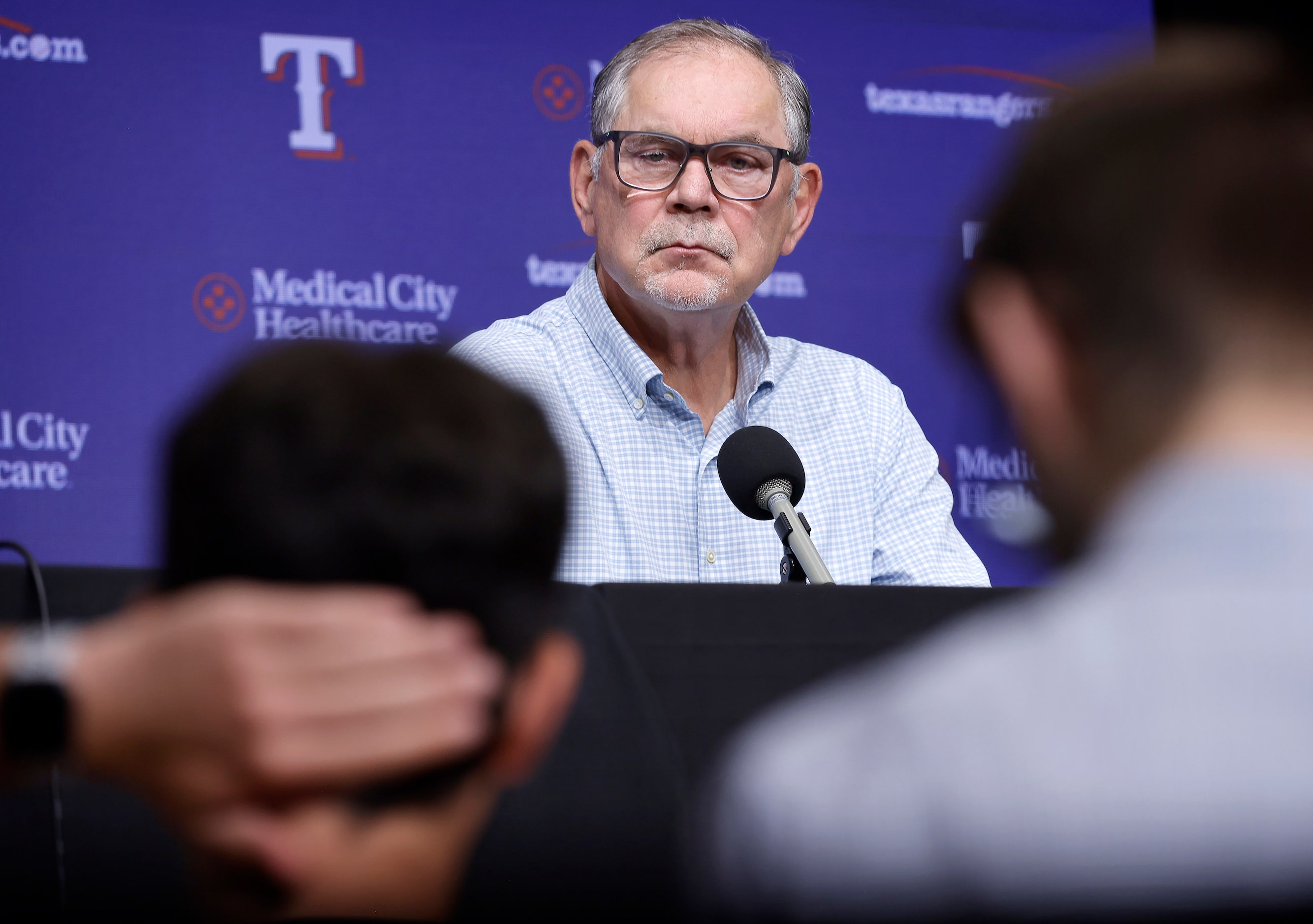 Texas Rangers manager Bruce Bochy listens to a  reporters question during a post season wrap...