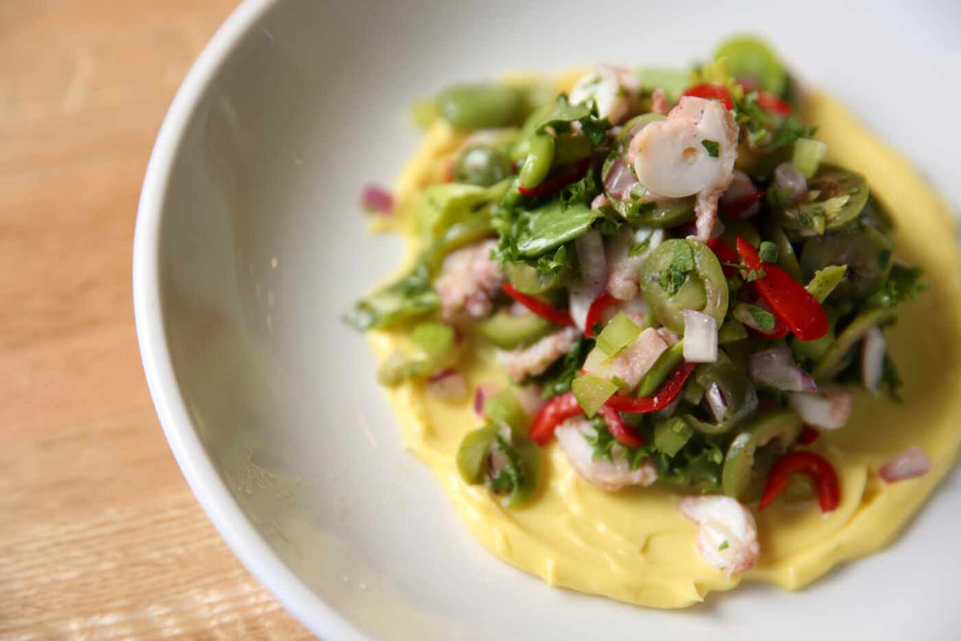 Piattello's octopus and Castelvetrano olive antipasto on saffron aioli (Rose Baca/The Dallas...