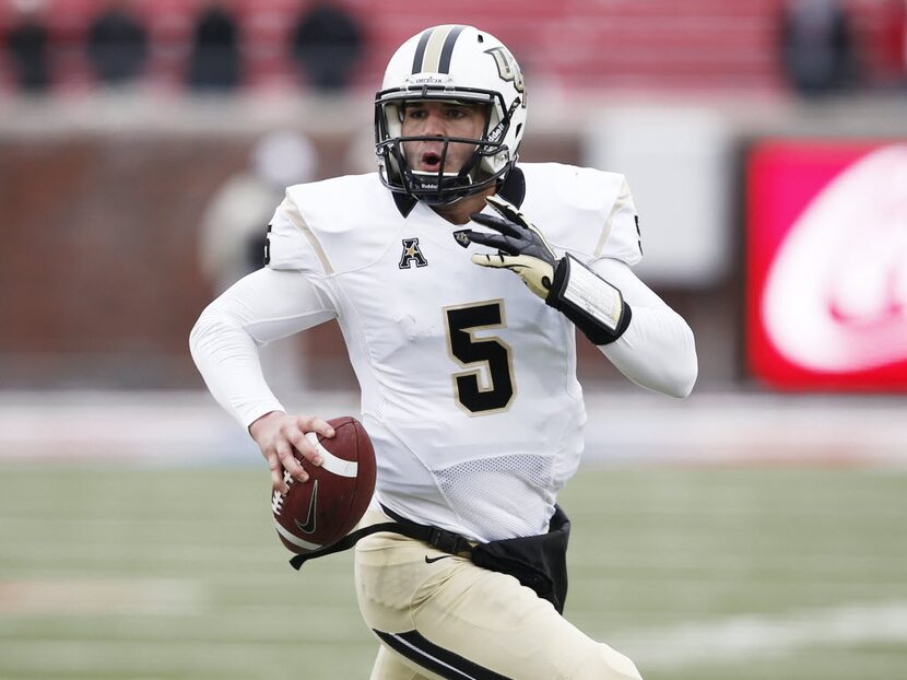 Dec 7, 2013; Dallas, TX, USA; UCF Knights quarterback Blake Bortles (5) runs for a touchdown...