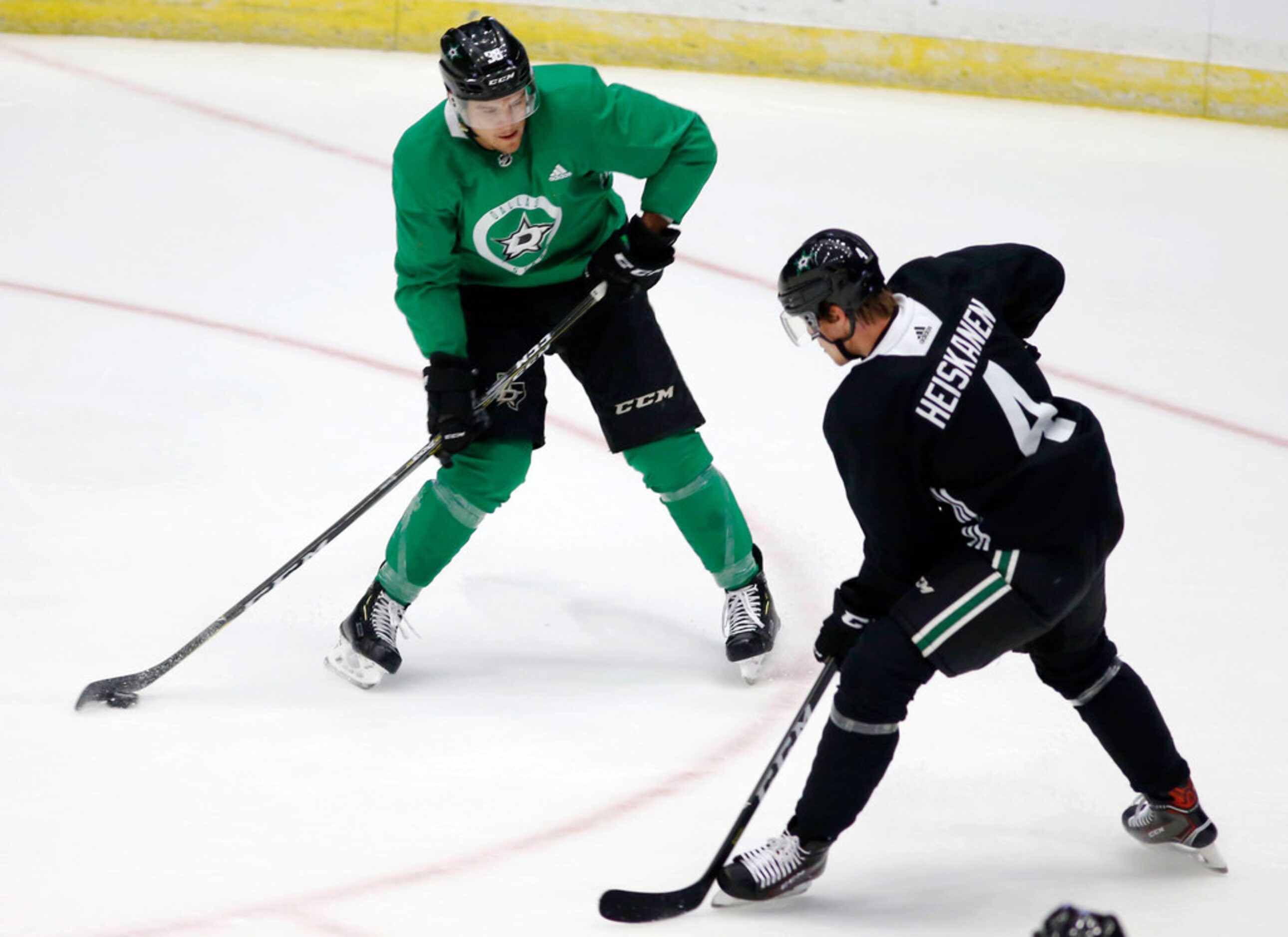 Dallas Stars Joel L'Esperance (38) attempts to pass in front of Dallas Stars defenseman Miro...