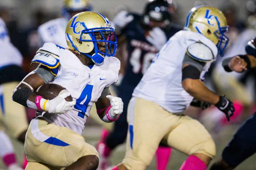 Garland Lakeview running back Camar Wheaton (4) runs the ball during the second quarter of a...