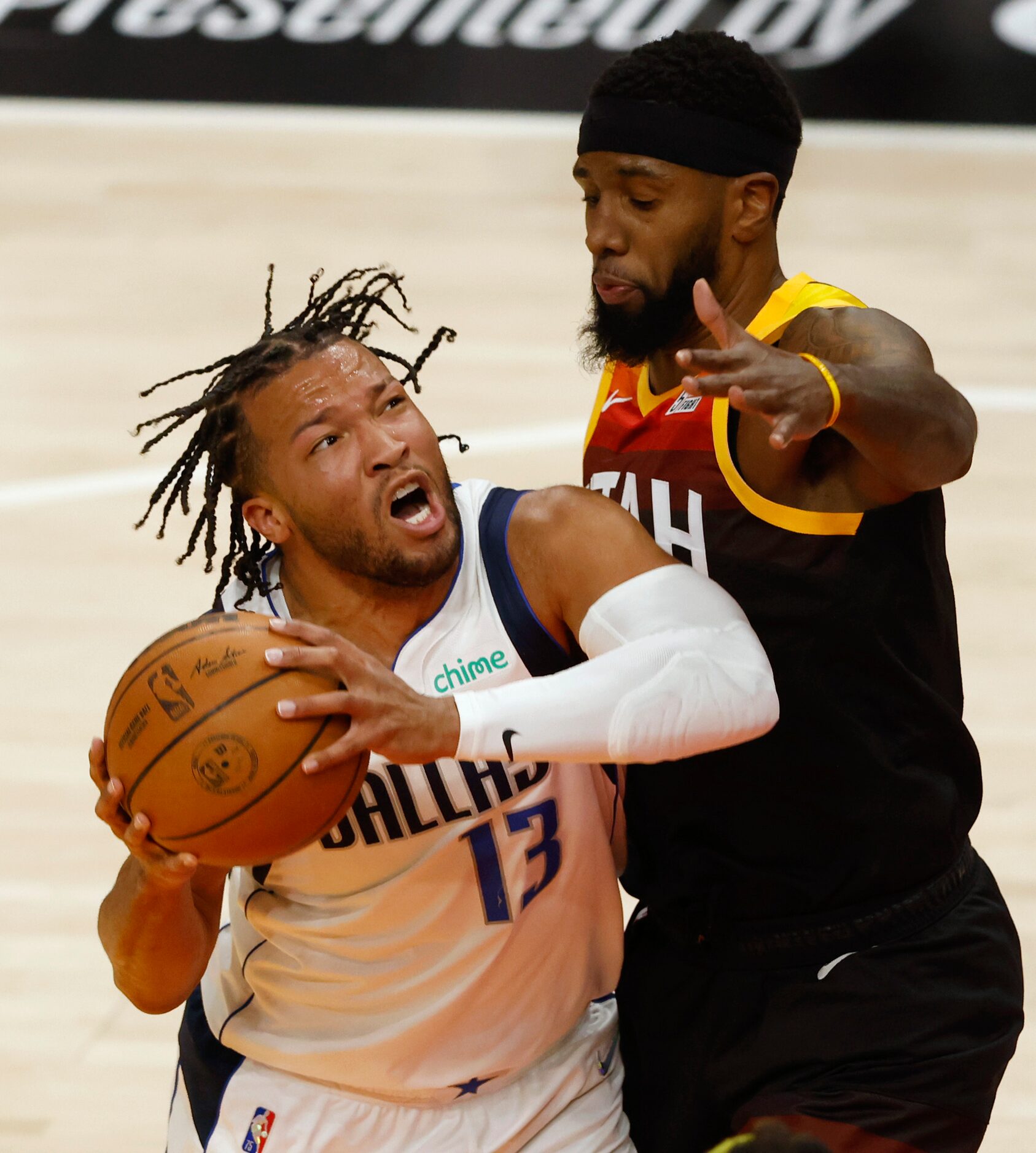 Dallas Mavericks guard Jalen Brunson (13) drives to the basket as Utah Jazz forward Royce...