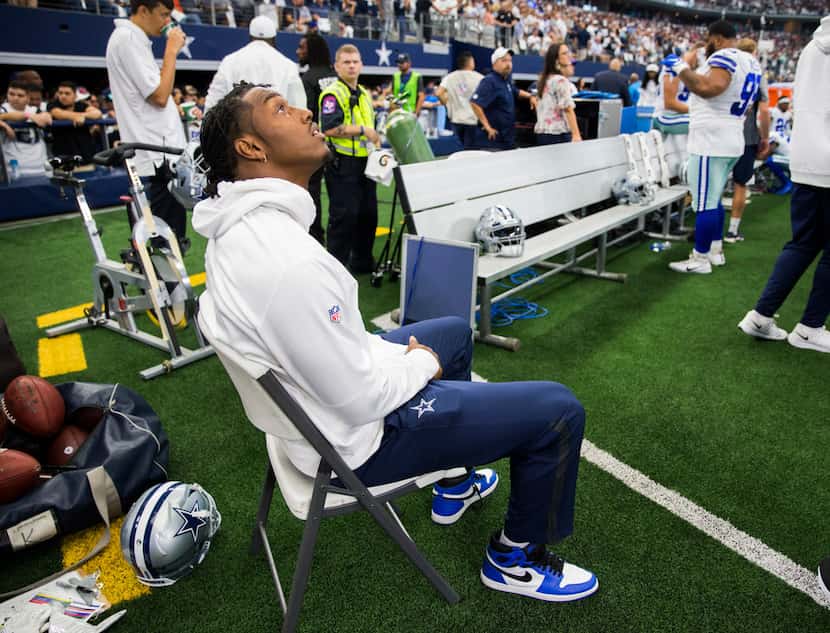Dallas Cowboys defensive end Taco Charlton (97) sits on the sideline during the first...