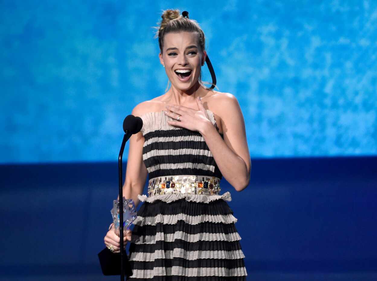 Margot Robbie accepts the award for best actress in a comedy for "I, Tonya" at the 23rd...