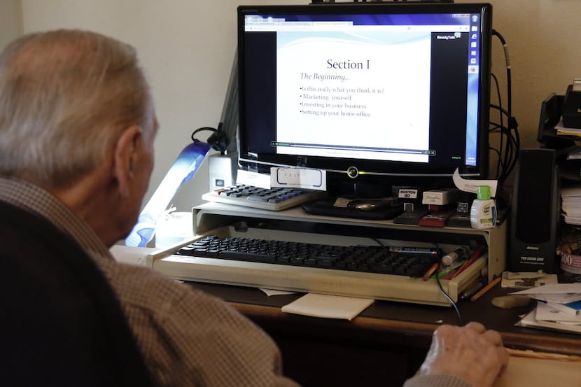 File photo of Arno Zwillenberg, 91, doing online training at his personal computer at his...