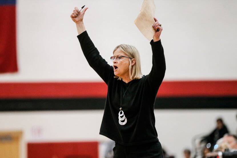 Irving MacArthur head coach Suzie Oelschlegel shouts instructions to her players during the...