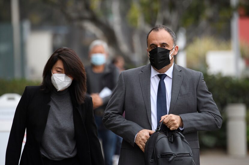 Mark Towfiq and his wife Carol Nakahara arrive for a court hearing in Santa Ana, Calif., on...