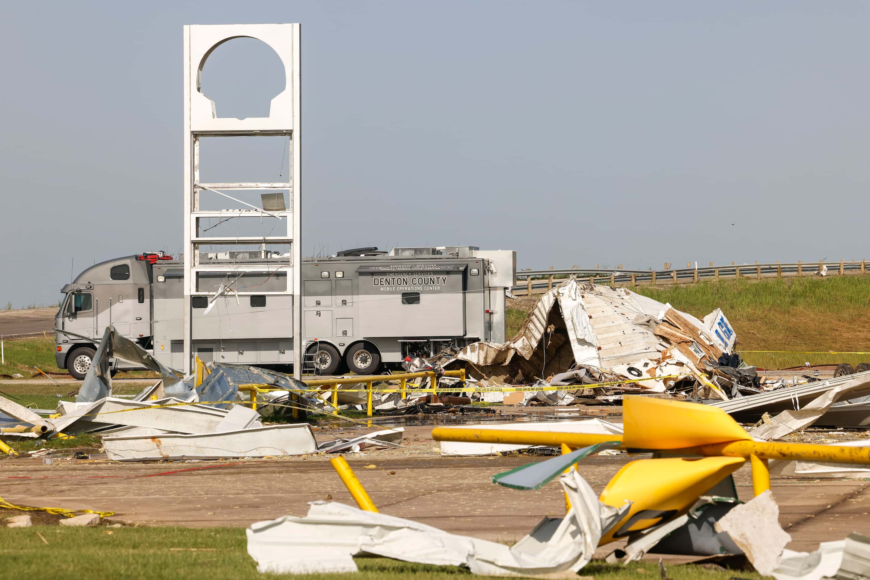 Debris scattered around a Shell gas station, on Sunday, May 26, 2024, in Valley View, after...