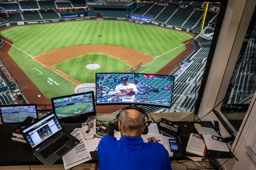 Texas Rangers broadcaster Eric Nadel announces the game between the Texas Rangers game and...