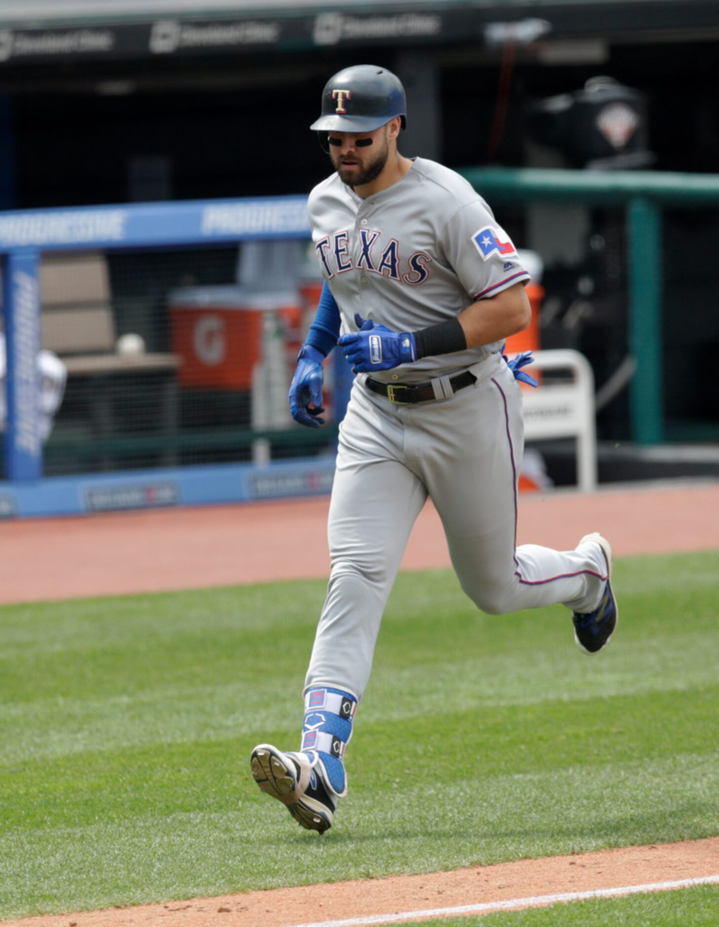 Texas Rangers' Joey Gallo runs the bases after a solo home run in the seventh inning of a...