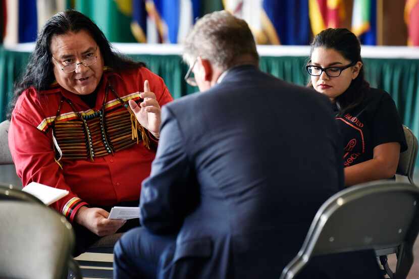 Leroy Peña, a legislative aide with the Lipan Apache Tribe of Texas, left, and Angela...